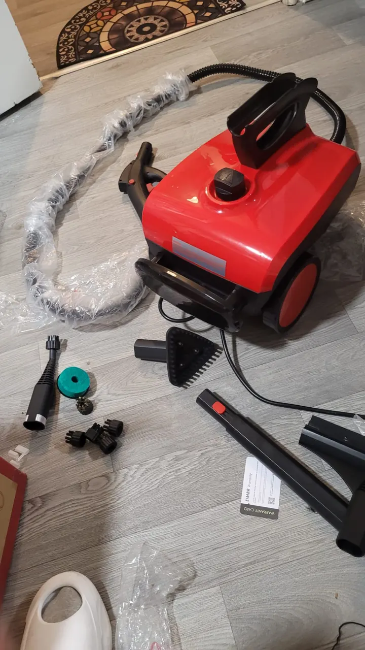 Steam cleaner and attachments set out ready for a job